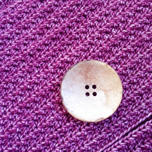 huge button and Stitch Detail on the vest, using Scheepjes Stone Washed in Garnet
