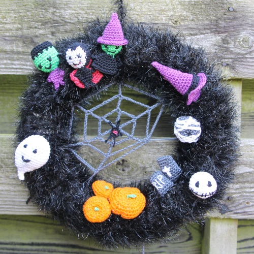 Halloween Wreath by @missneriss. Scheepjes Panda Sparkle available from http://bit.ly/woolwarehouse